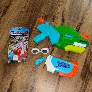 Assorted summer stuff - kids goggles, 2 water soaker, package of water balloons